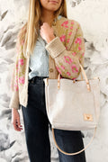 Girl holding a new Birch White Leather Tote