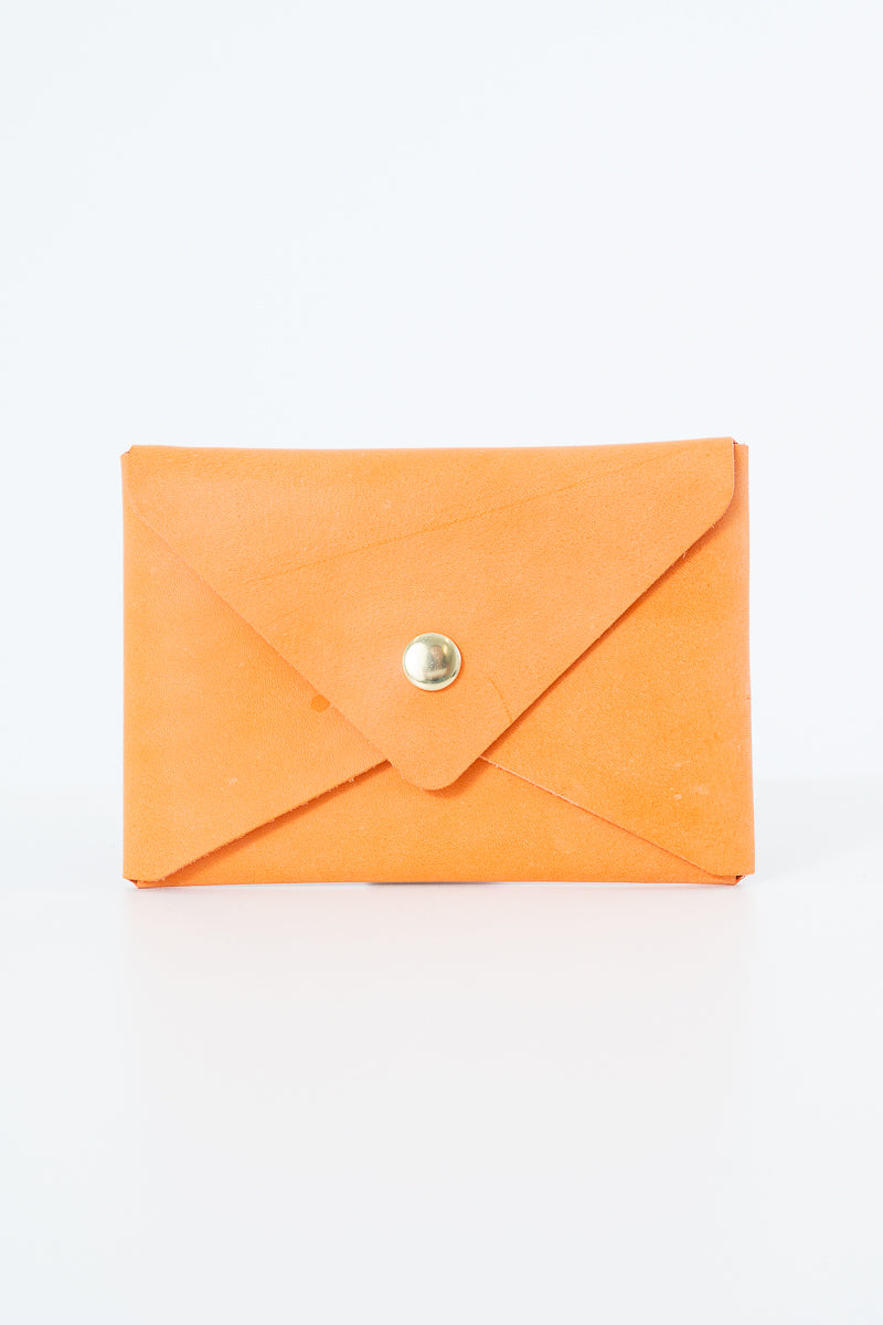 Orange leather Meanwhile Back on the Farm wallet with a button