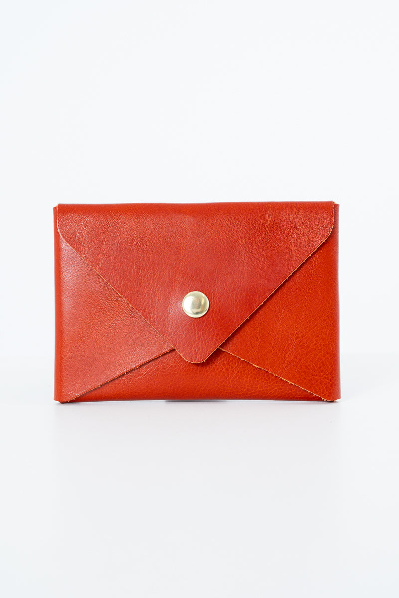 Red leather Meanwhile Back on the Farm wallet with a button