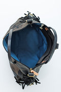 Interior of graphite camouflage wax canvas backpack with fringe