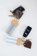 Keychain with blue and white striped key fob, heart-shaped charm, and car keys