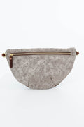 A light gray leather fanny pack with an embossed paisley pattern and a brown zipper, shown against a plain white background. Handcrafted by Meanwhile Back on the Farm in Lynchburg, Va.
