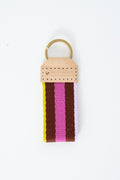 Colorful striped Meanwhile Back on the Farm webbing key fob