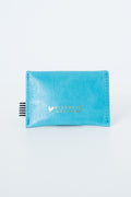 Blue snap pouch with Meanwhile brand logo