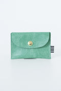 Green snap pouch with a gold snap closure