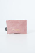 Pink snap pouch with gold Meanwhile brand logo text