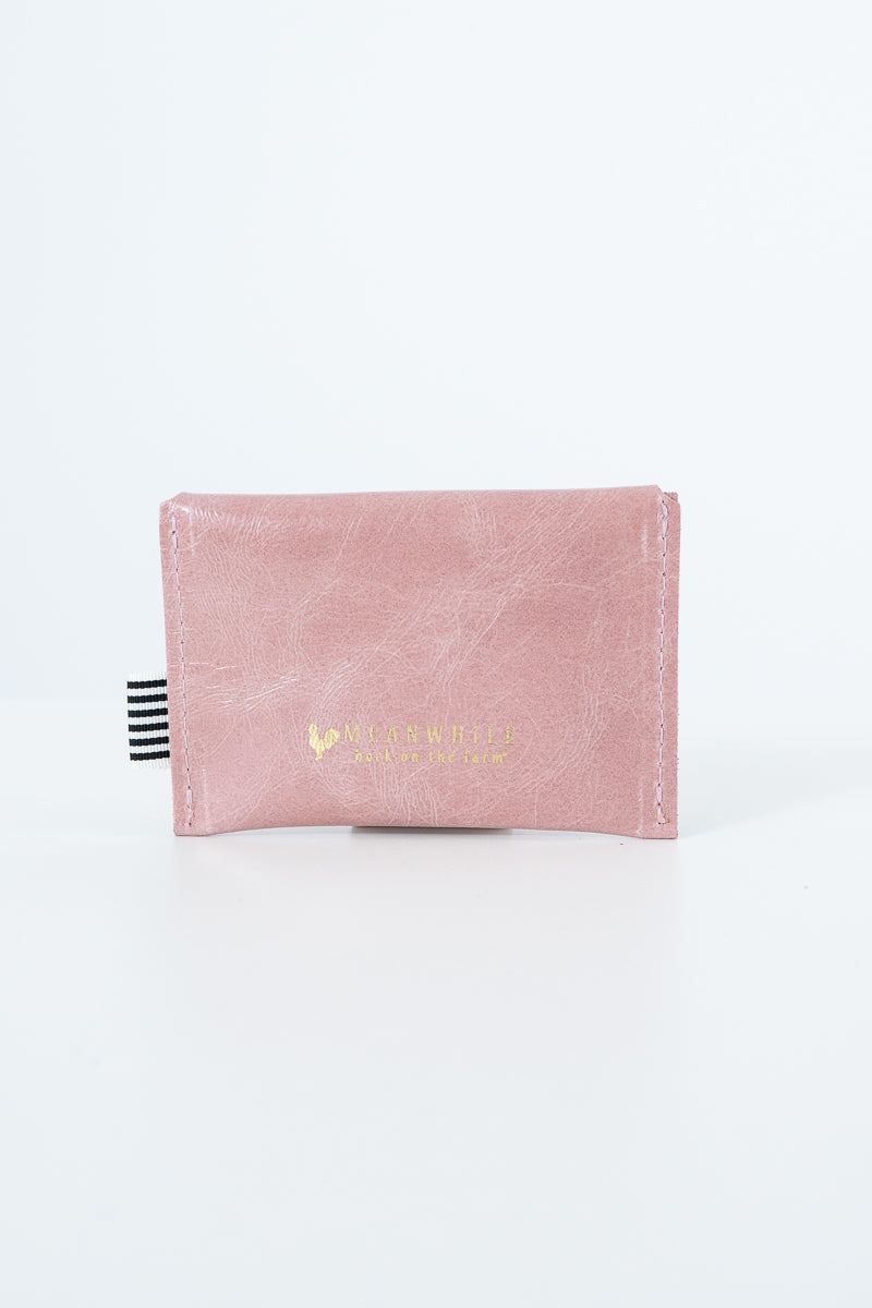 Pink snap pouch with gold Meanwhile brand logo text