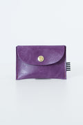 Purple snap pouch with a gold snap closure