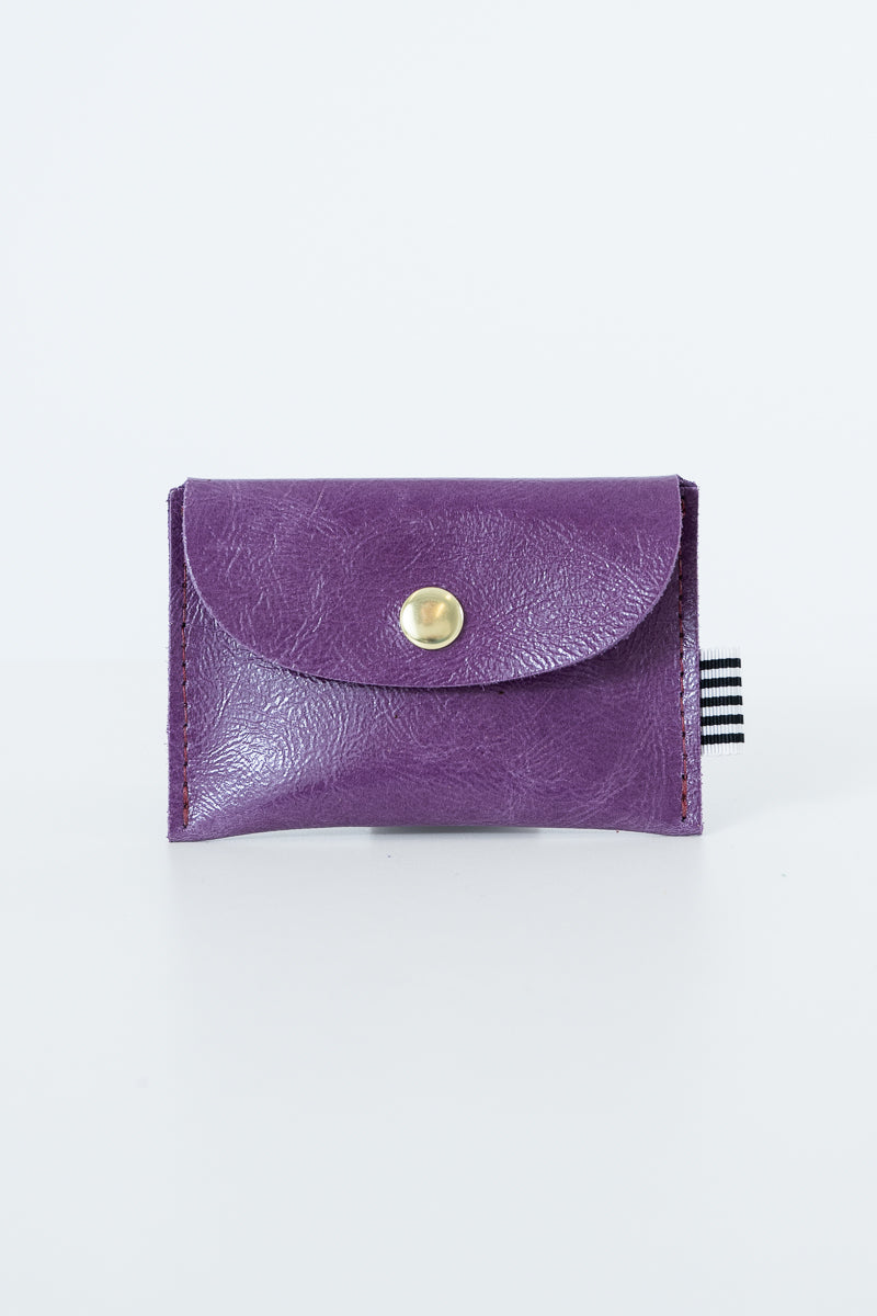 Purple snap pouch with a gold snap closure