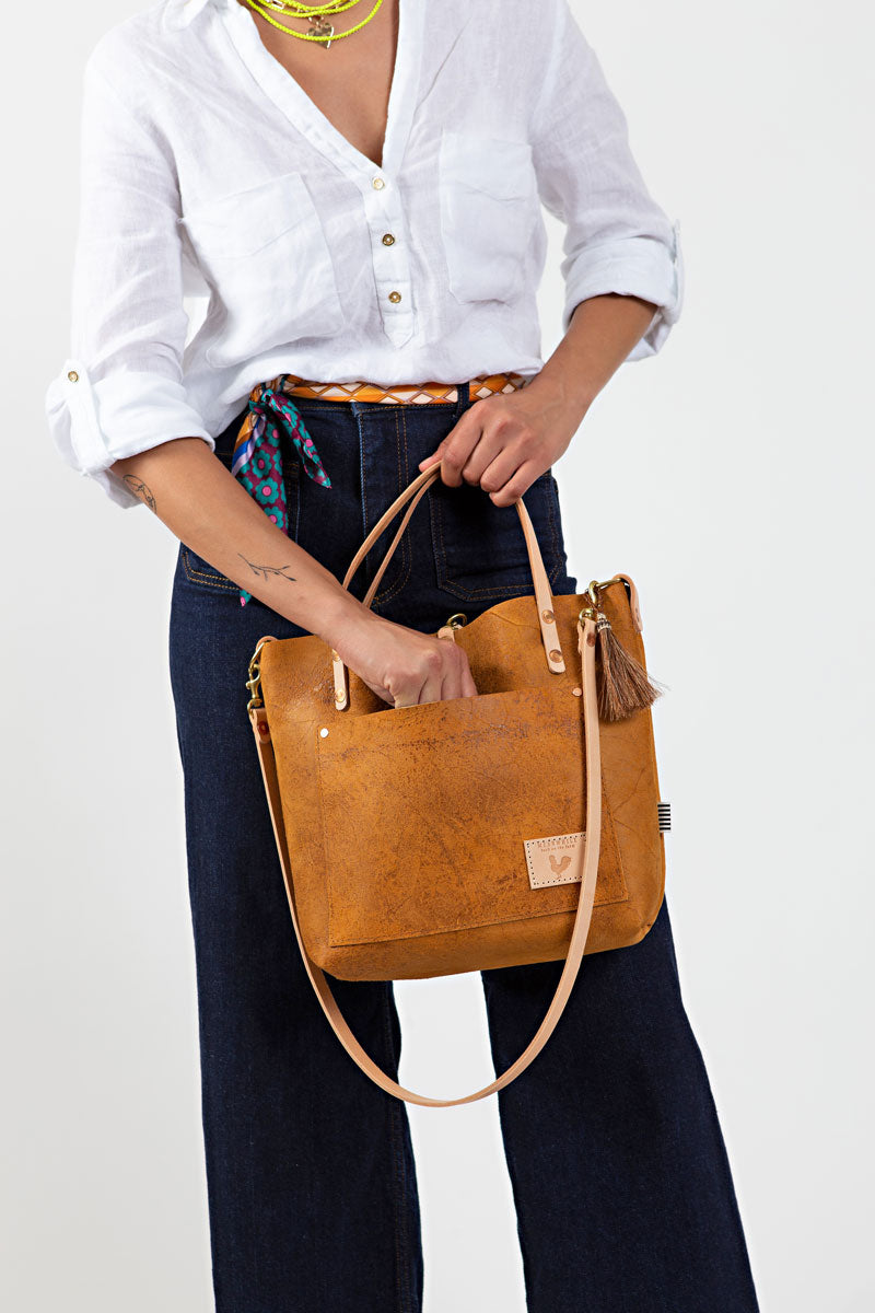 Women holding vintage birch leather small tote