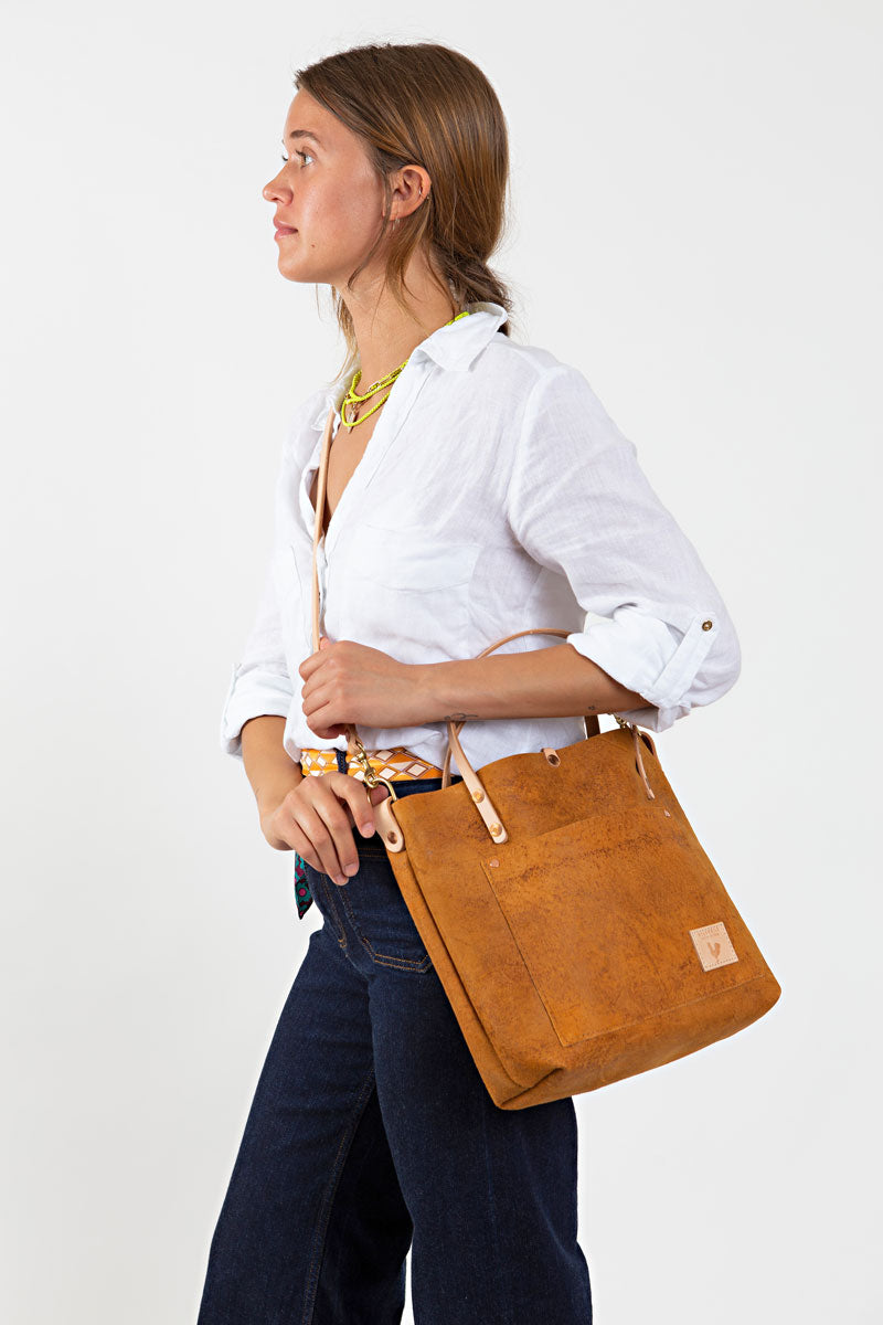 Women holding vintage birch leather small tote