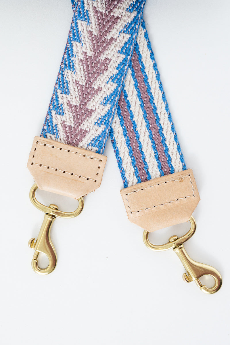 Colorful striped strap with brass hardware