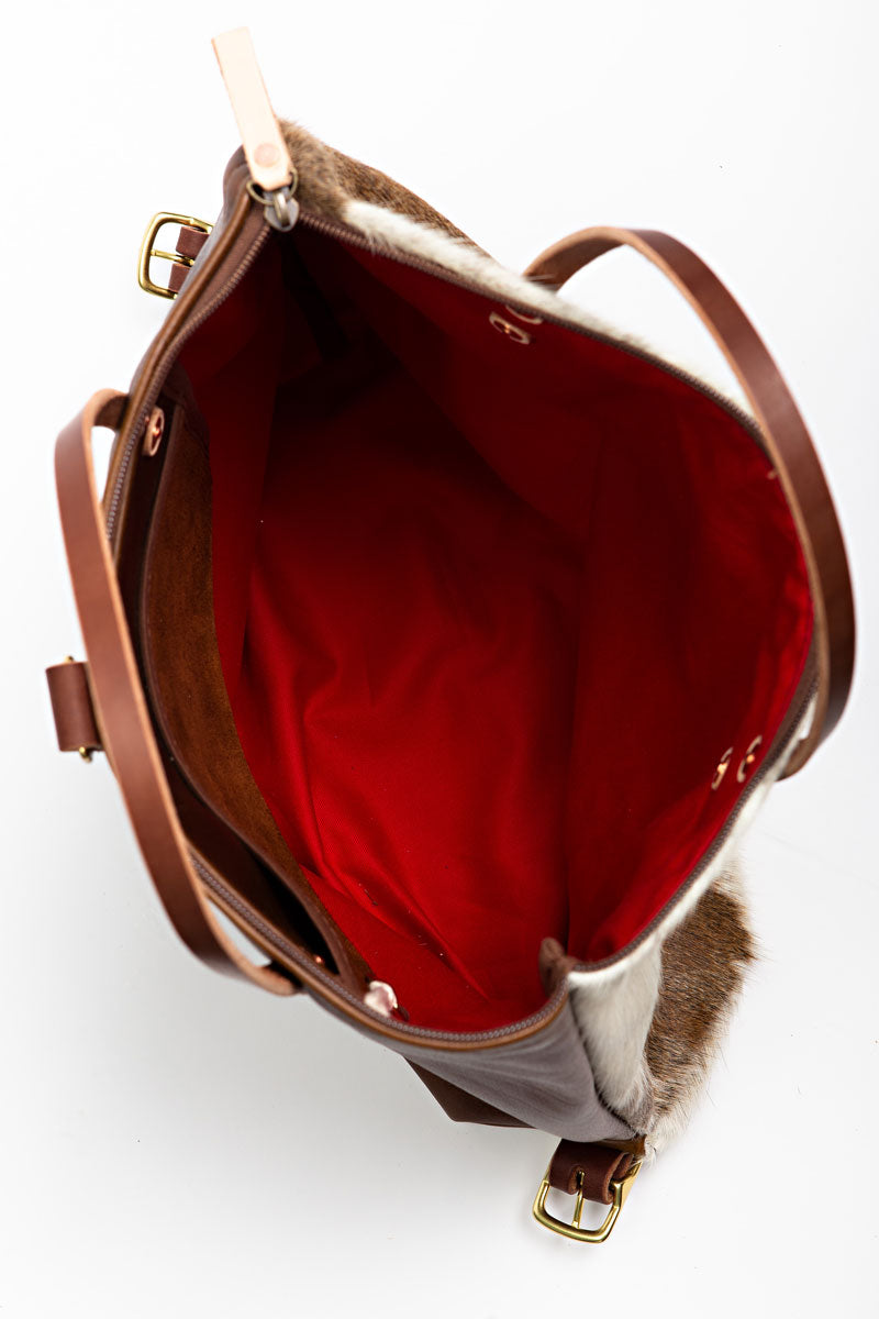 The interior of the hair on hide backpack 