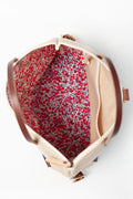 the floral interior of the natural brown backpack