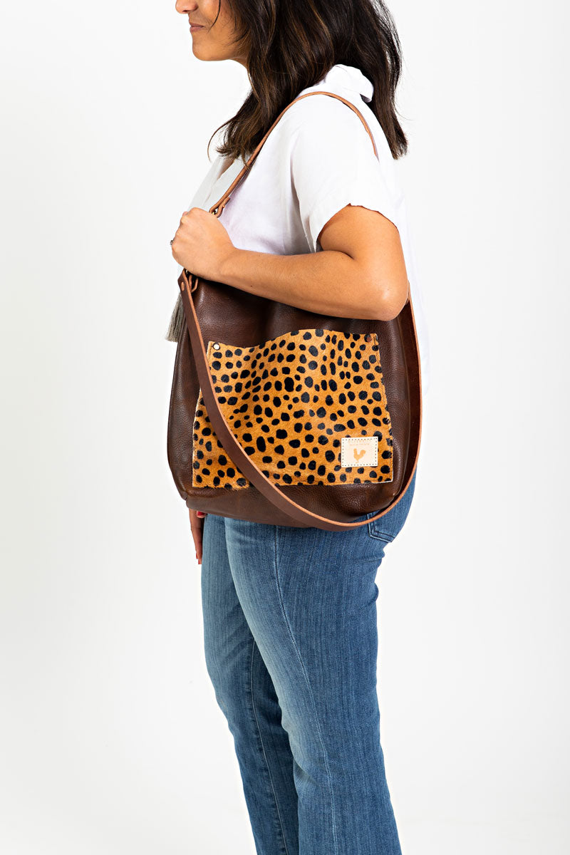 the carryall cheetah bag
