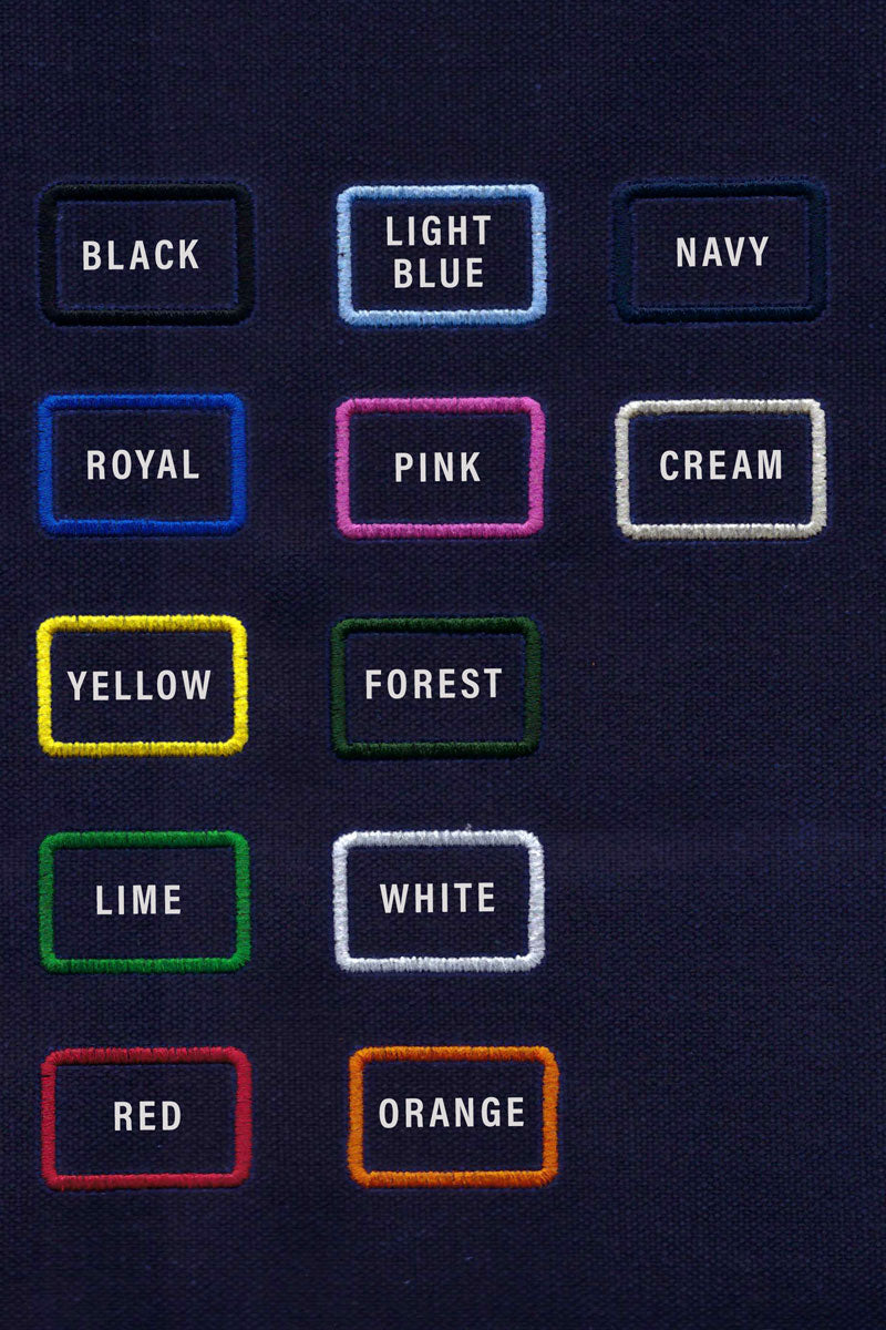 Picture of various monogram color options. Options include black, royal blue, yellow, lime green, red, light blue, pink, forest green, white, orange, navy blue and cream.