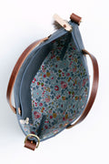 the floral interior of the slate blue small tote